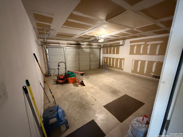 garage featuring a garage door opener