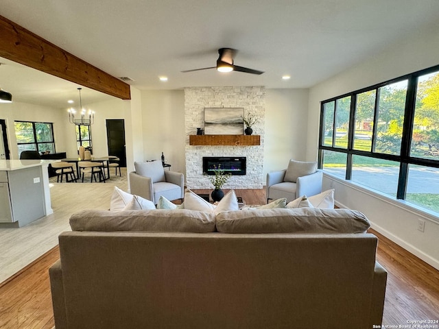 728 Rittiman, Terrell Hills, TX 78209 - living area featuring healthy amount of natural light, a chandelier, a fireplace, light wood-type flooring, and recessed lighting
