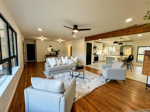 728 Rittiman, Terrell Hills, TX 78209 - living room featuring wood finished floors, a ceiling fan, recessed lighting, and baseboards
