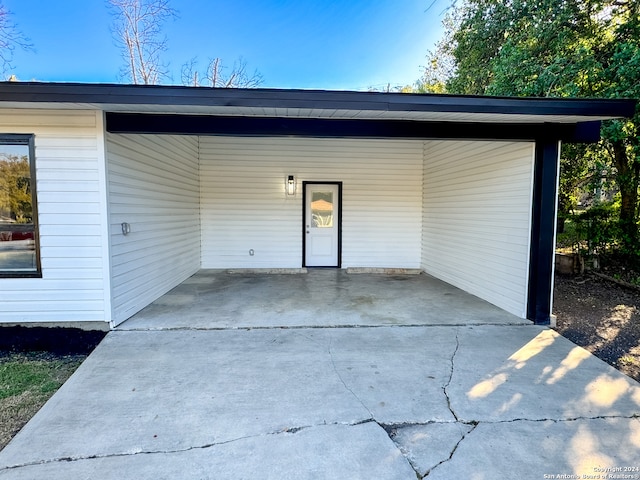 exterior space featuring a carport