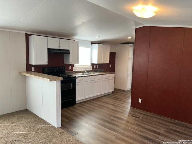 kitchen featuring white cabinetry, black electric range, dark wood-type flooring, and vaulted ceiling