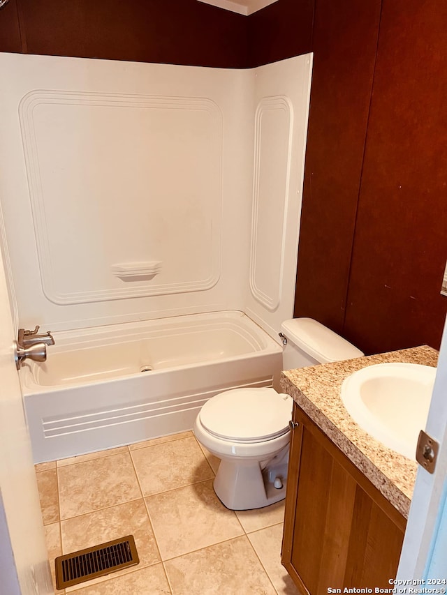 full bathroom with tile patterned floors, vanity, toilet, and shower / washtub combination