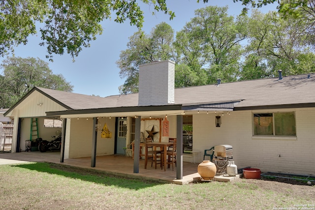 rear view of property with a patio