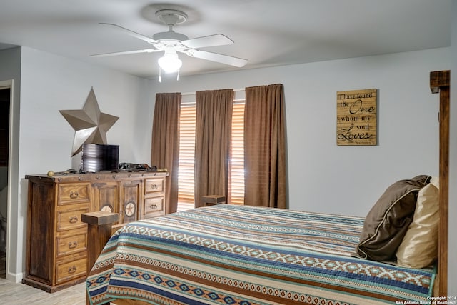 bedroom featuring ceiling fan and light wood-type flooring