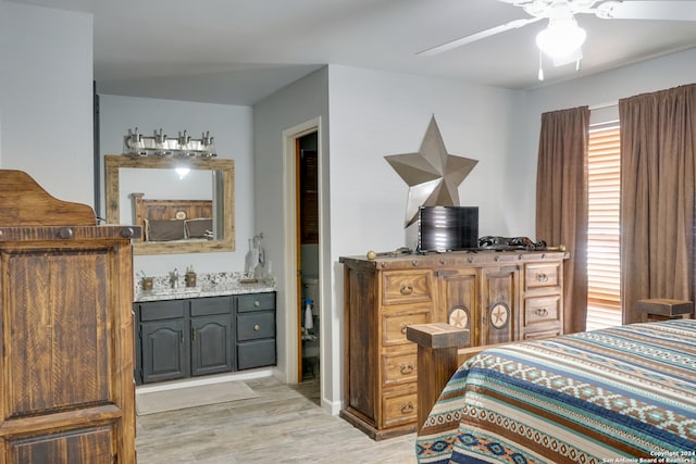 bedroom with ceiling fan and light wood-type flooring