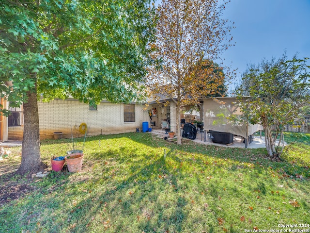 view of yard with a patio area