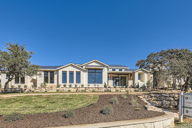 view of front of house featuring solar panels