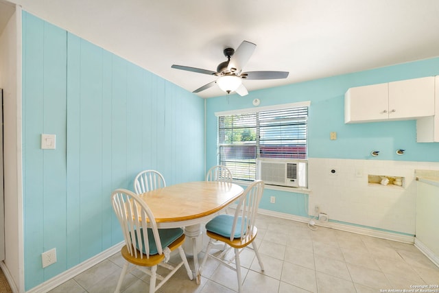 dining space with ceiling fan and light tile patterned floors