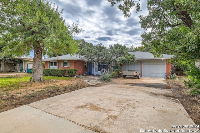 single story home featuring a garage