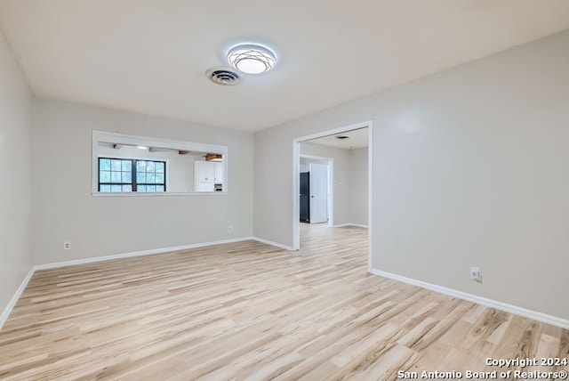 empty room featuring light hardwood / wood-style flooring