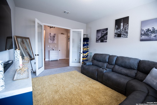 9104 Pepperton Ln, San Antonio, TX 78254 - living room with french doors, carpet flooring, and baseboards