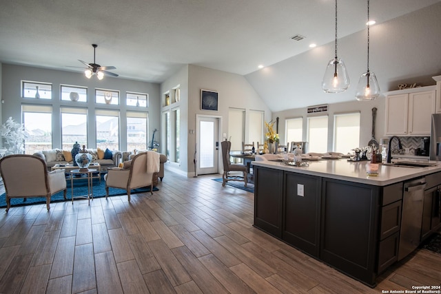 9104 Pepperton Ln, San Antonio, TX 78254 - kitchen featuring a sink, light countertops, stainless steel dishwasher, open floor plan, and ceiling fan