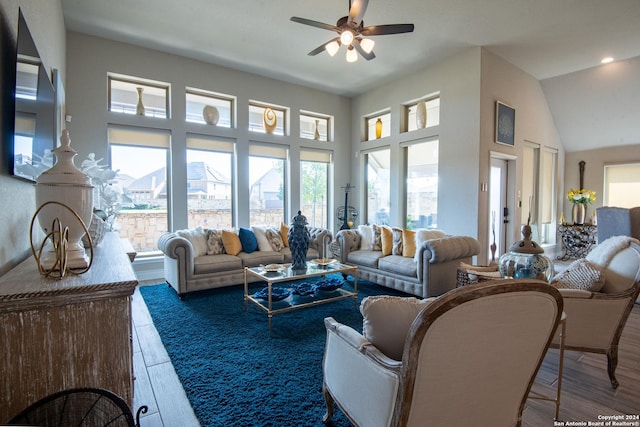 9104 Pepperton Ln, San Antonio, TX 78254 - living room featuring plenty of natural light, a ceiling fan, wood finished floors, a towering ceiling, and recessed lighting