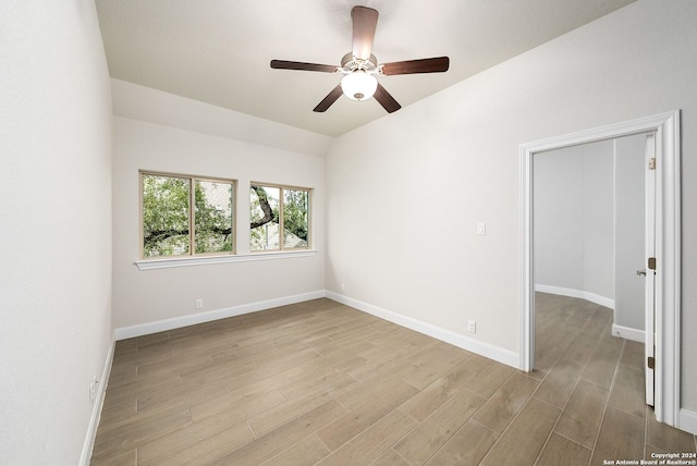 unfurnished room with light hardwood / wood-style flooring and ceiling fan