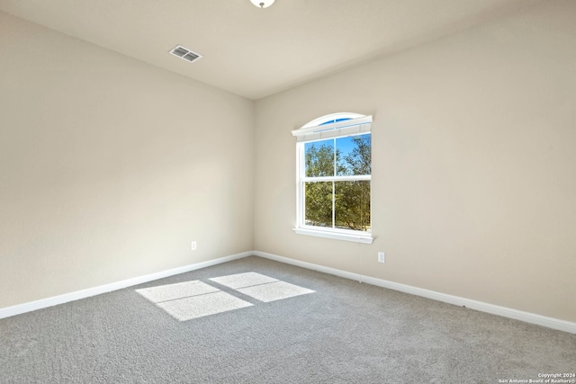 view of carpeted spare room