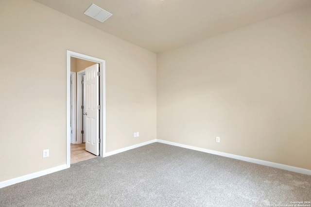 view of carpeted spare room