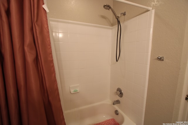 bathroom featuring shower / bath combination with curtain