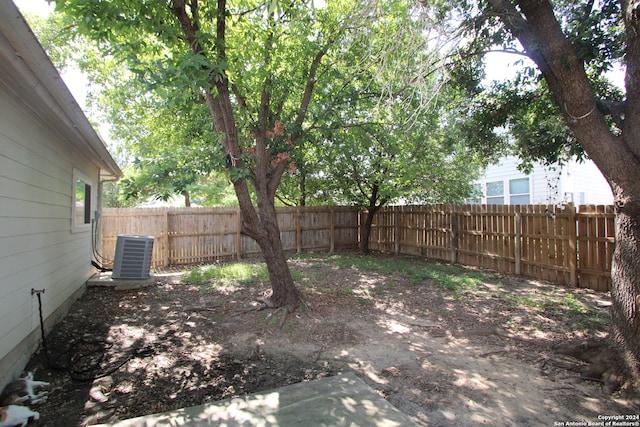 view of yard featuring central AC unit