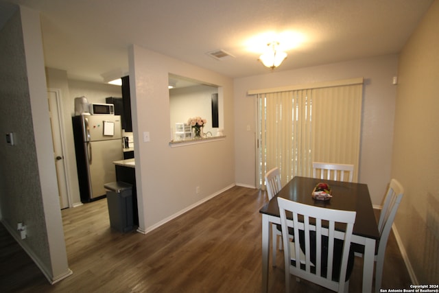 dining room featuring dark hardwood / wood-style floors