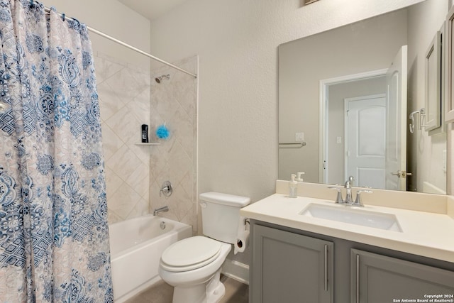 full bathroom featuring shower / bath combo with shower curtain, vanity, and toilet