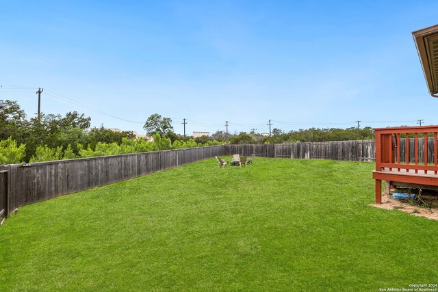 view of yard featuring a deck