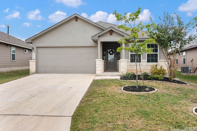 view of front of house with a garage and a front yard