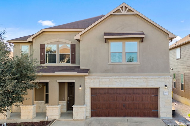 view of front of property featuring a garage