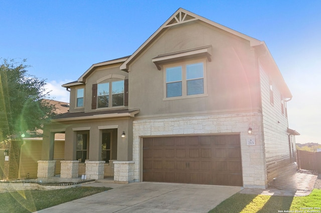 view of front of property with a garage