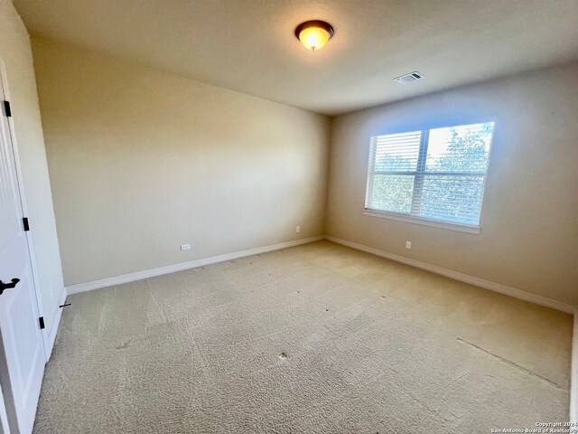 empty room with light carpet