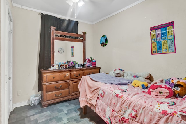 bedroom with ceiling fan and ornamental molding