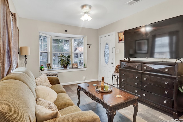 living room with ceiling fan