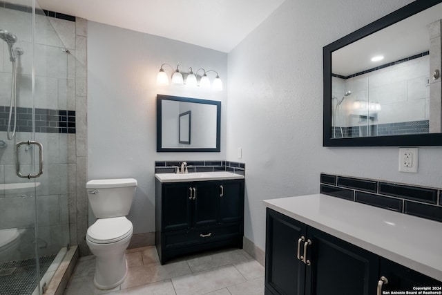3947 Gayle Ave, San Antonio, TX 78223 - full bath featuring toilet, a stall shower, vanity, and baseboards