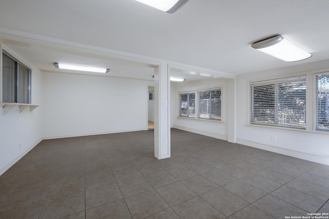 3947 Gayle Ave, San Antonio, TX 78223 - below grade area featuring tile patterned flooring and baseboards