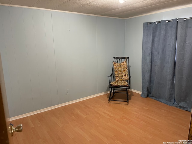 unfurnished room with hardwood / wood-style flooring