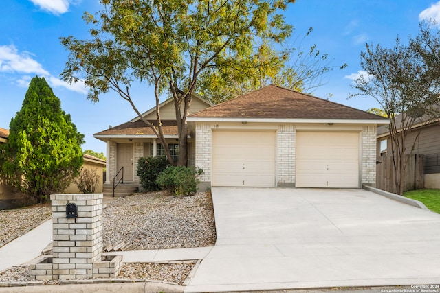 ranch-style home with a garage