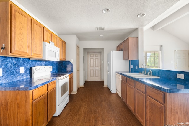 kitchen with tasteful backsplash, white appliances, sink, lofted ceiling with beams, and dark hardwood / wood-style floors