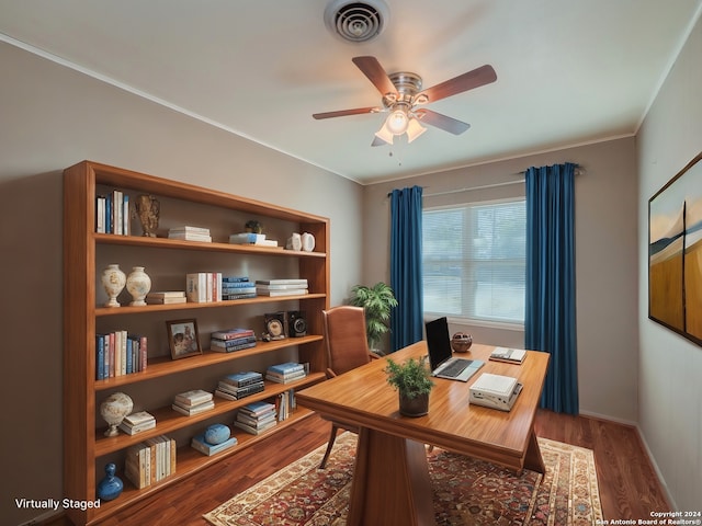 office space featuring crown molding and dark wood-type flooring