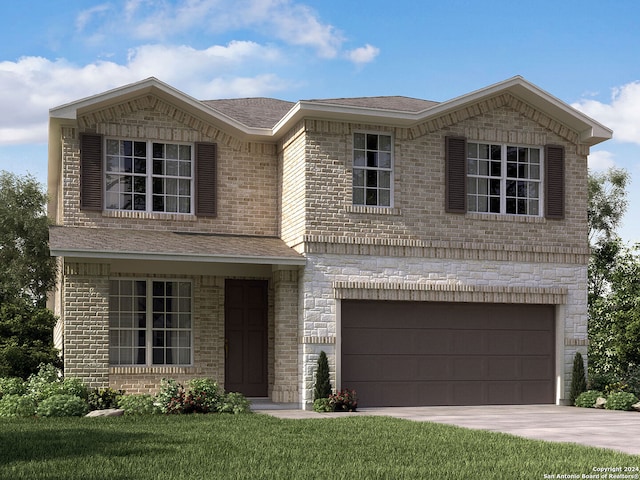 view of property with a garage and a front lawn