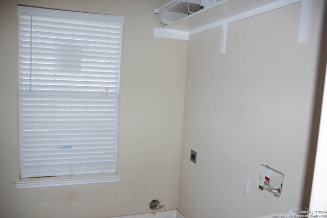 laundry area with electric dryer hookup and hookup for a washing machine