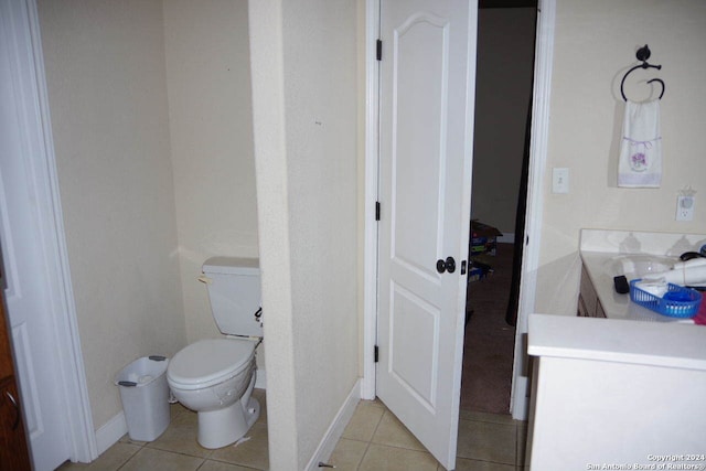 bathroom featuring tile patterned floors, sink, and toilet