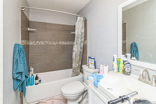 full bathroom with shower / bath combo with shower curtain, vanity, and toilet