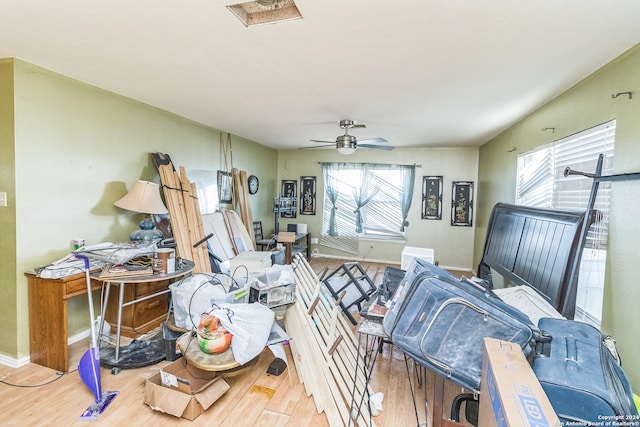 misc room featuring ceiling fan and hardwood / wood-style flooring