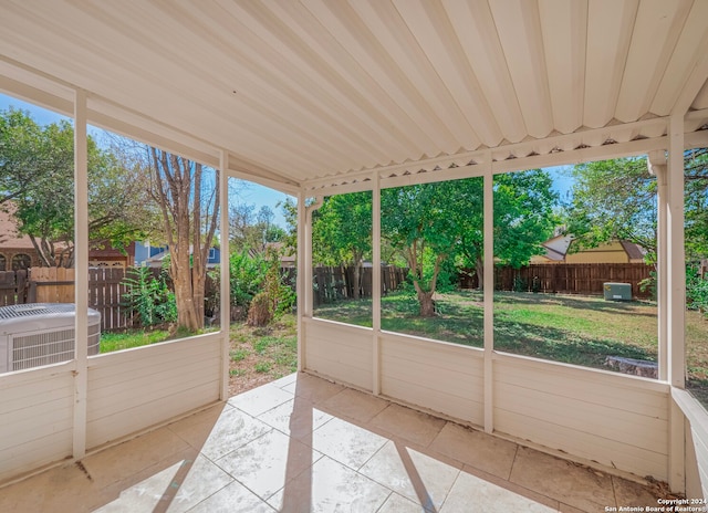 unfurnished sunroom featuring a healthy amount of sunlight