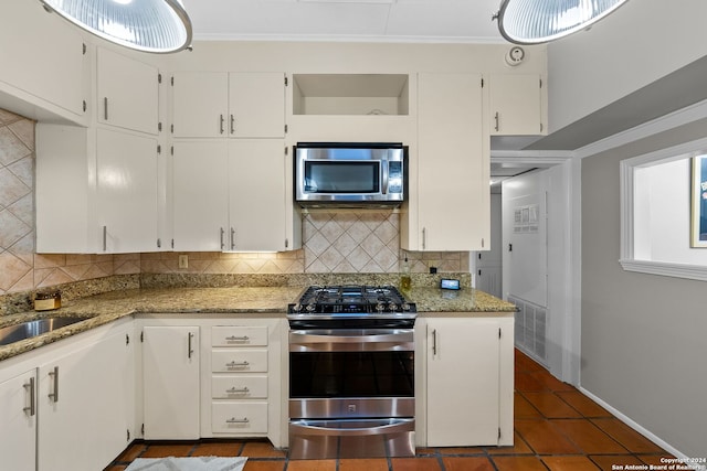 kitchen featuring white cabinets and stainless steel appliances