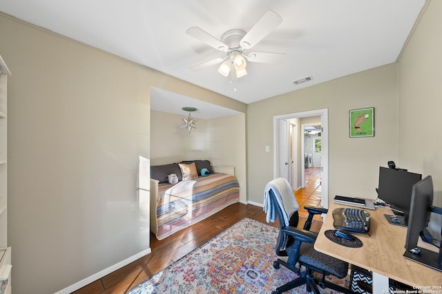 office space with ceiling fan and wood-type flooring