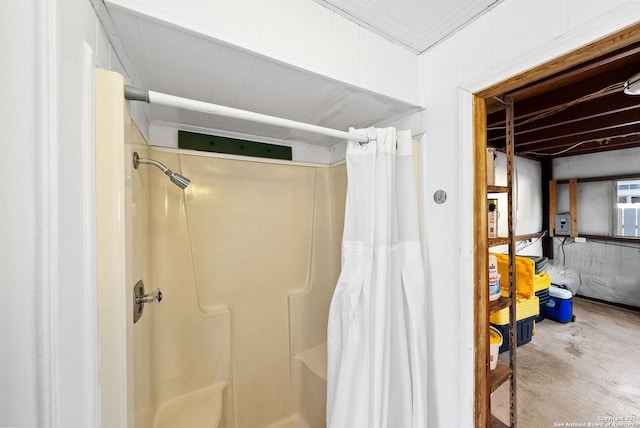 bathroom featuring concrete flooring and walk in shower