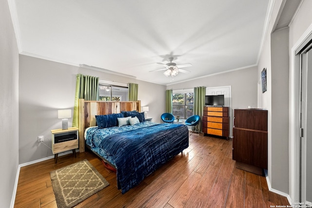 bedroom with ceiling fan, wood-type flooring, and ornamental molding