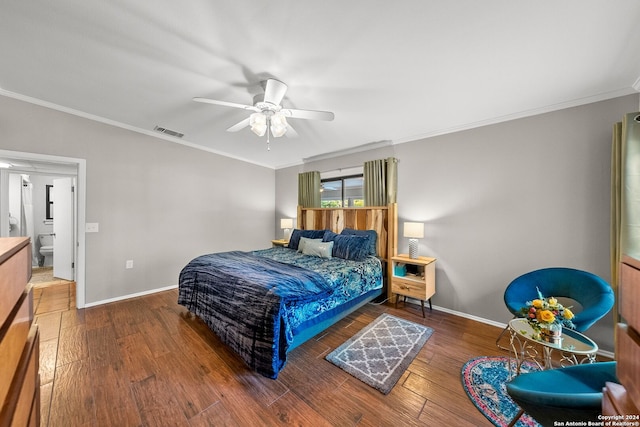 bedroom featuring ceiling fan, dark hardwood / wood-style flooring, and crown molding