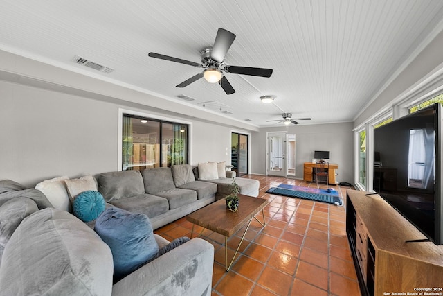 living room featuring tile patterned flooring, french doors, and ceiling fan