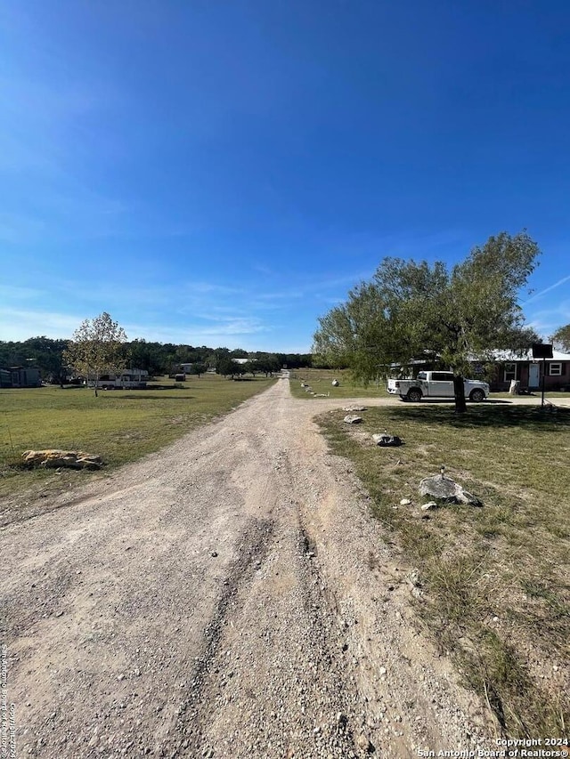 view of road featuring a rural view